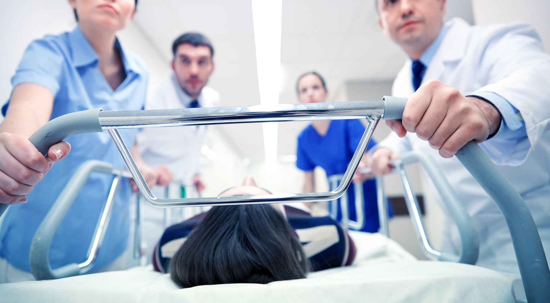 medics and patient in a hospital