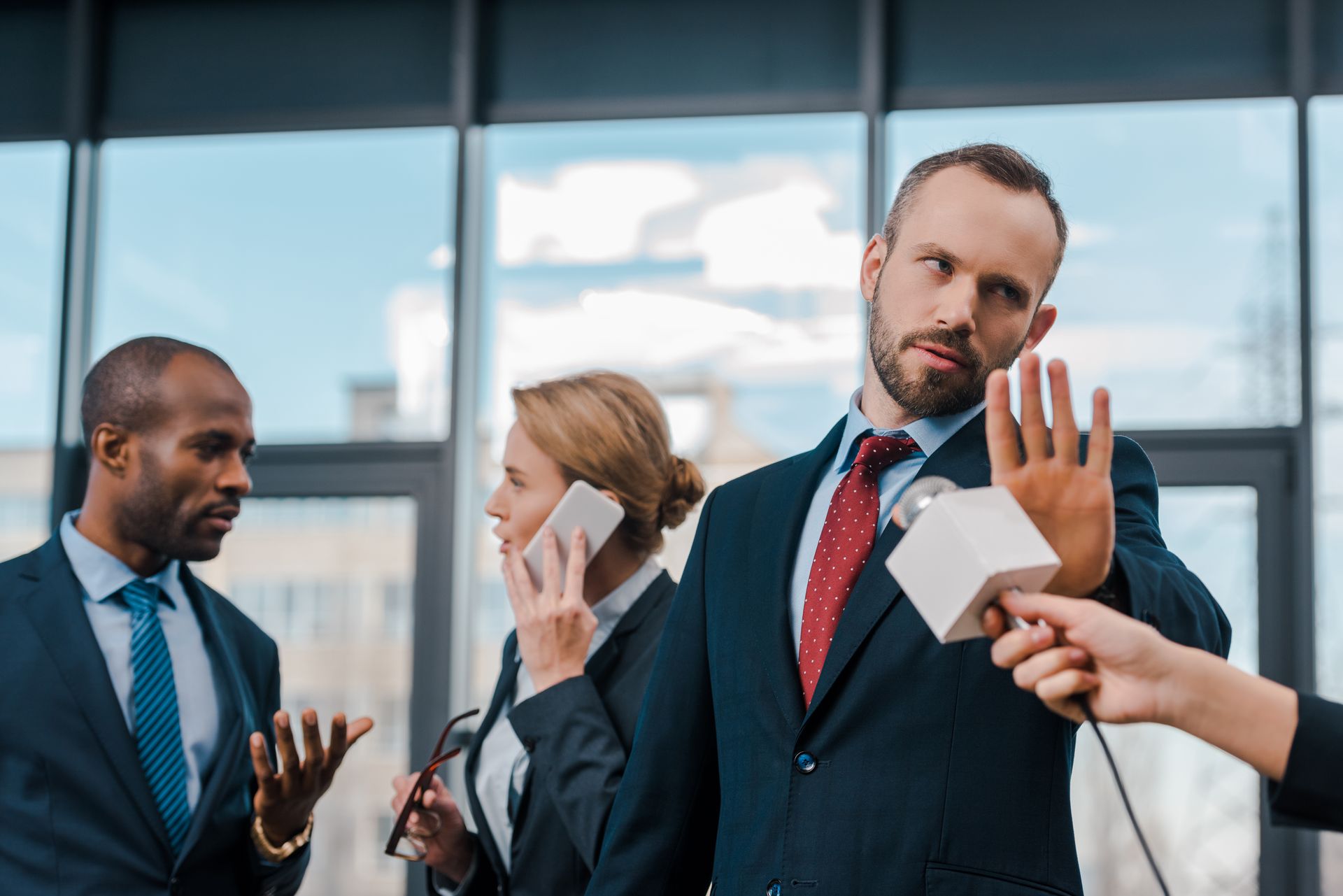 selective focus of businessman showing no questions gesture