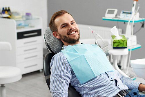 man waiting at the dental treatment room