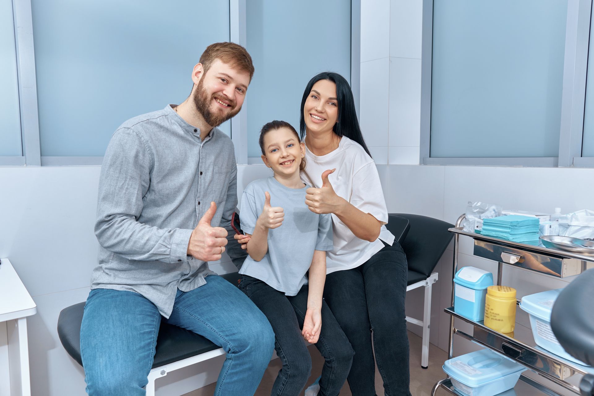 A happy family at a doctor's office, representing a positive experience in family medicine