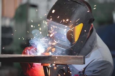 Welding With Helmet — New Philadelphia, OH — Gemstone Gas & Welding Supplies