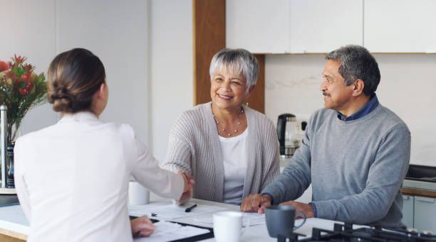 Injured Woman Shaking Hands - Warsaw, NC | Kenan Law Firm PA