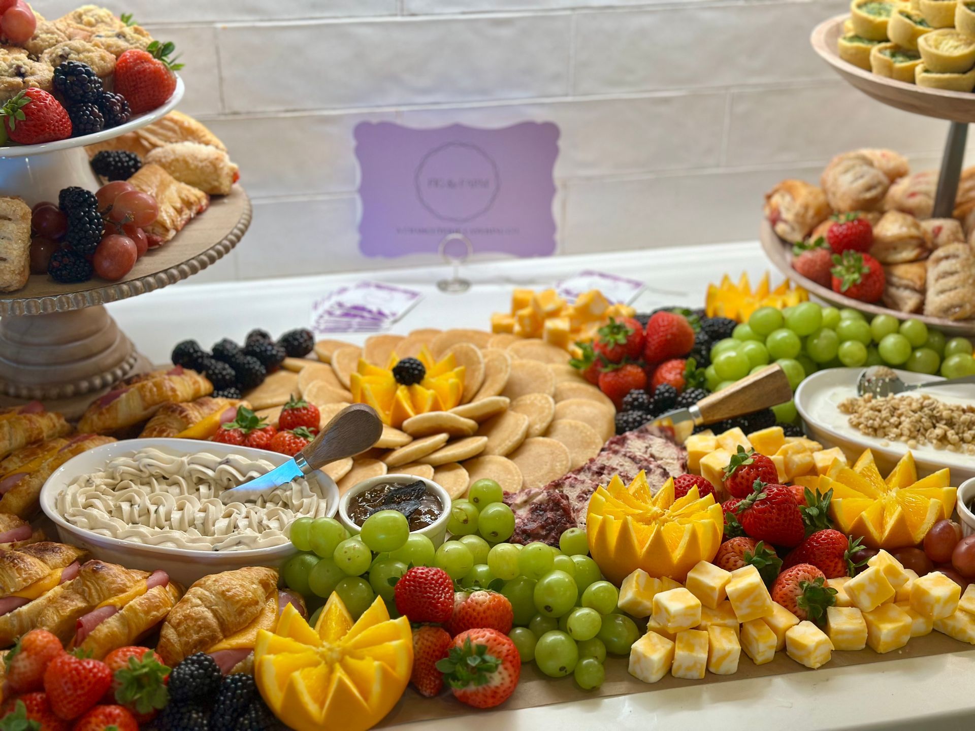 large brunch charcuterie table with props