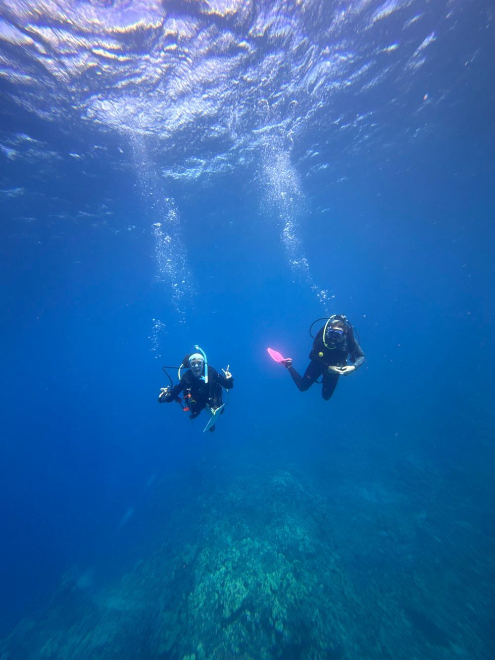 An aerial view of a boat in the ocean