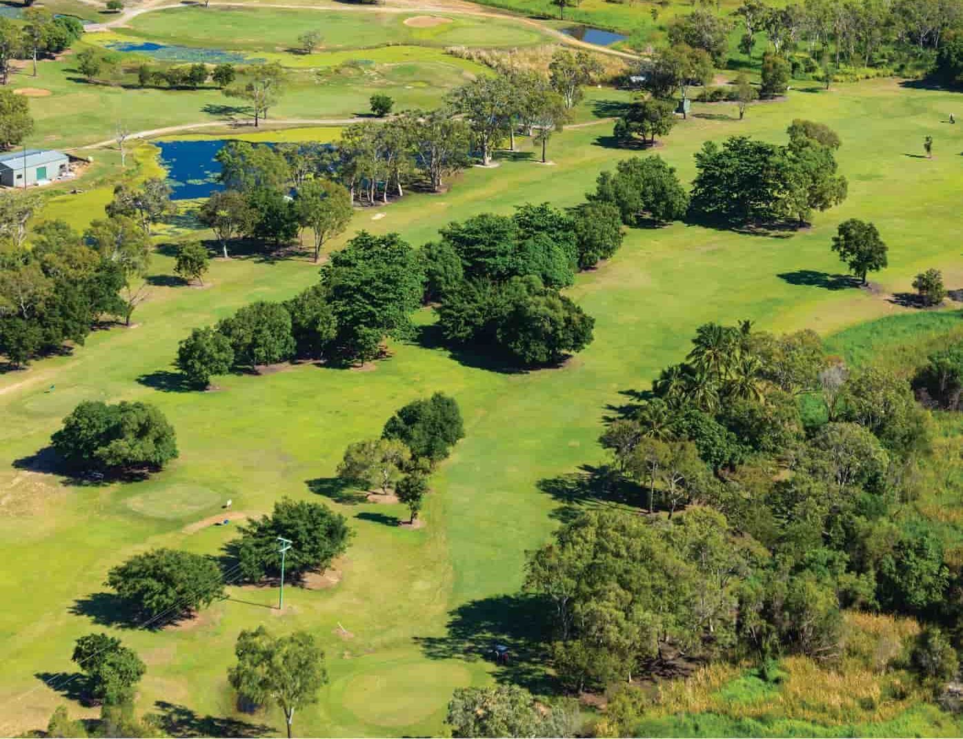 An Aerial View Of A Golf Course Surrounded By Trees — Rowes Bay Golf Club In Rowes Bay, QLD