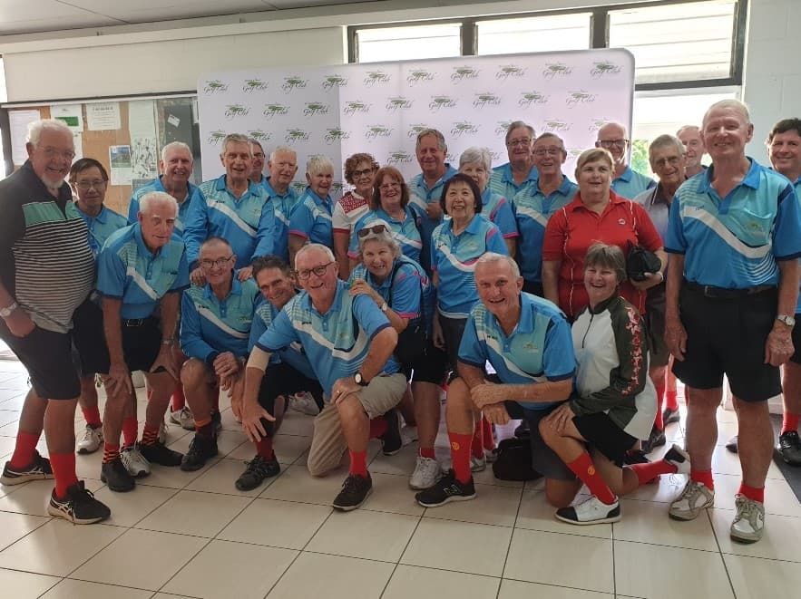 A Group Of Older People Are Posing For A Picture In A Room — Rowes Bay Golf Club In Rowes Bay, QLD