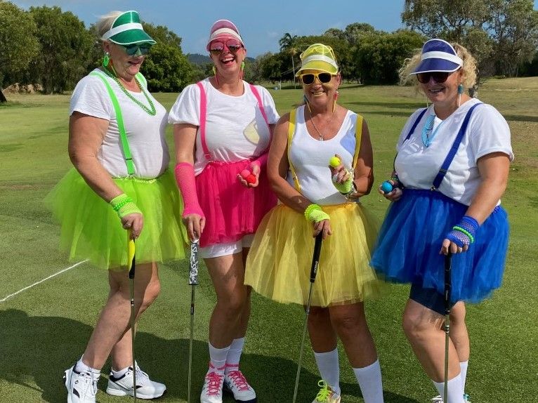 A Group Of Women Are Posing For A Picture On A Golf Course — Rowes Bay Golf Club In Rowes Bay, QLD