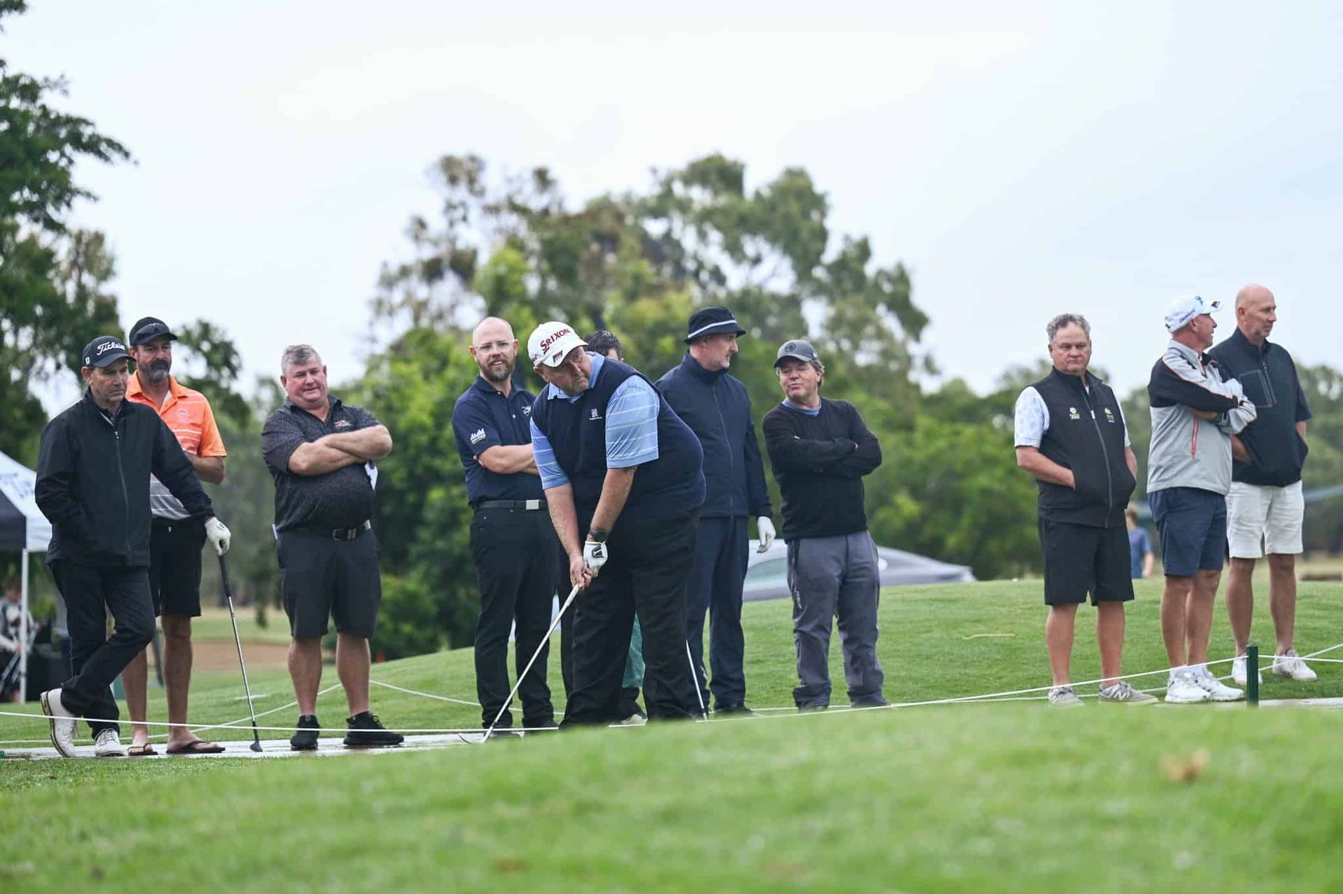 A Group Of Men Are Standing On A Golf Course — Rowes Bay Golf Club In Rowes Bay, QLD