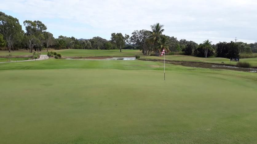 A Golf Course With A Green And Trees In The Background — Rowes Bay Golf Club In Rowes Bay, QLD