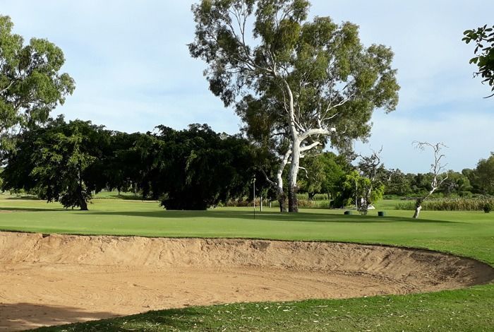A Bunker On A Golf Course With Trees In The Background — Rowes Bay Golf Club In Rowes Bay, QLD
