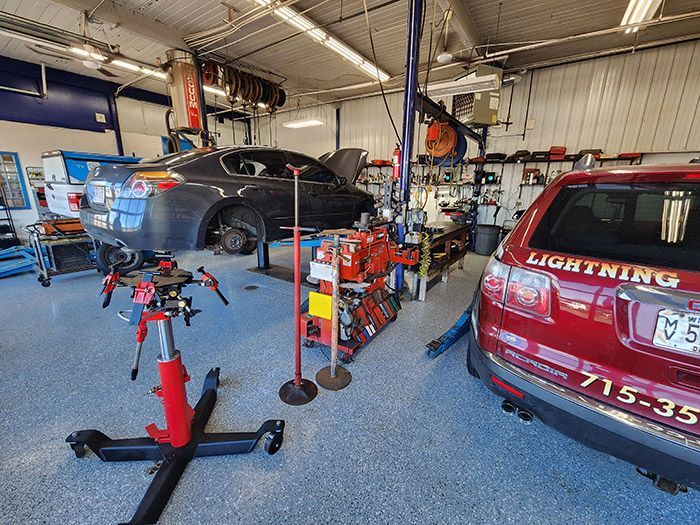 Garage with other trucks |  Lightning Auto Care Center