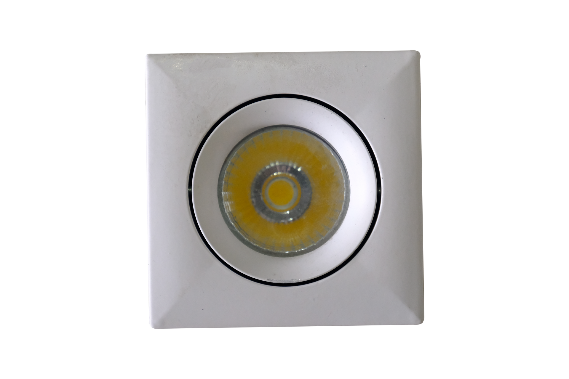 A white square light with a yellow light inside of it