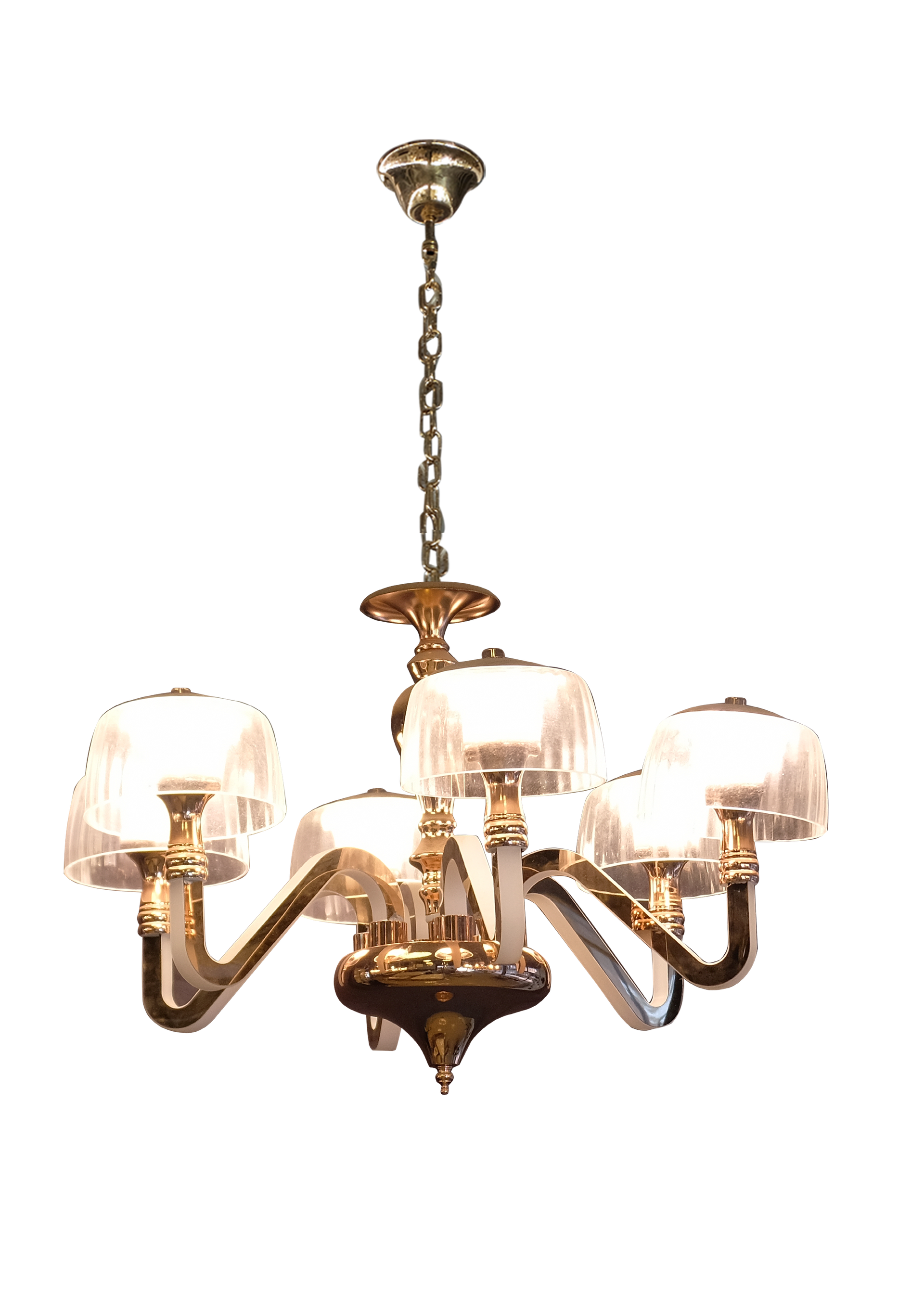 A brass chandelier with clear glass shades is hanging from the ceiling.
