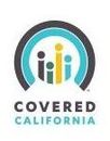 The logo for covered california is a circle with a rainbow in the middle.