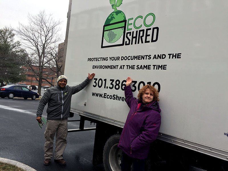 Two People Beside Eco Shred Truck — Vienna, VA — Fairfax Estate Sales TFV