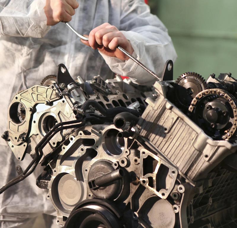 Mechanic Repairing Engine — Automotive Repair in Townsville