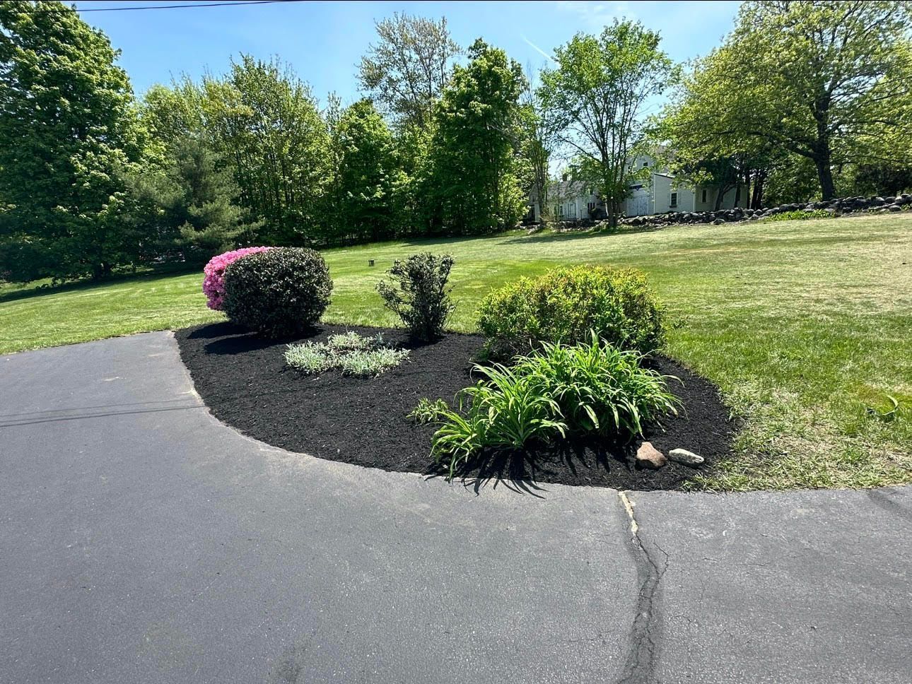bush trimming and new mulch installation service