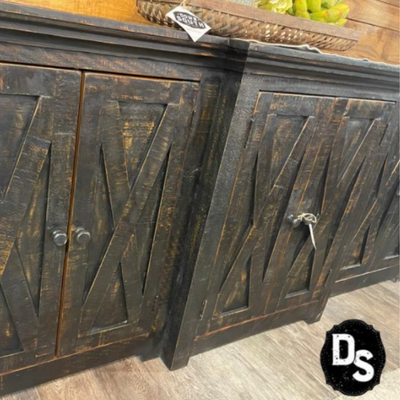 Rustic dark wood cabinets with diagonal plank doors and metal handles in a market display.