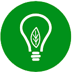A light bulb with a leaf inside of it in a green circle.