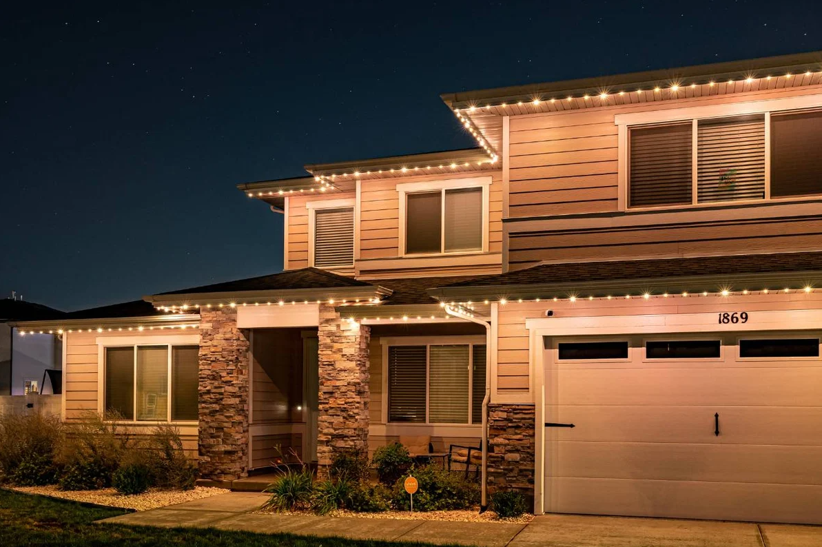 Rocky Mountain Trimlight permanent LED security lights illuminating a home’s exterior for safety and protection