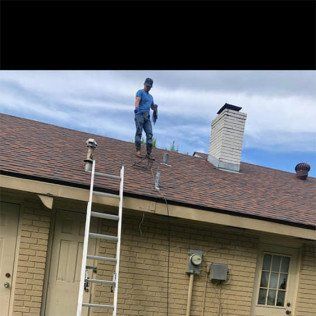 Man Repairing Roofing — Maurice, LA — Acadian Hydrojet