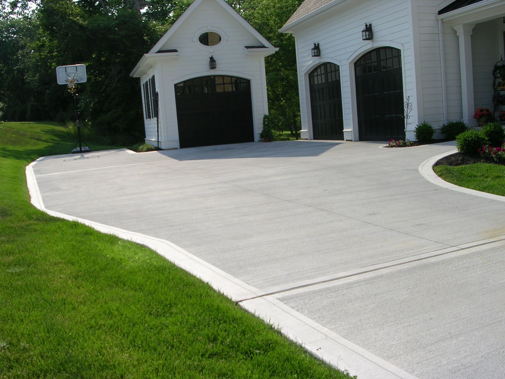 Brick paved patio adorned with comfortable patio furniture, perfect for outdoor relaxation and entertainment.