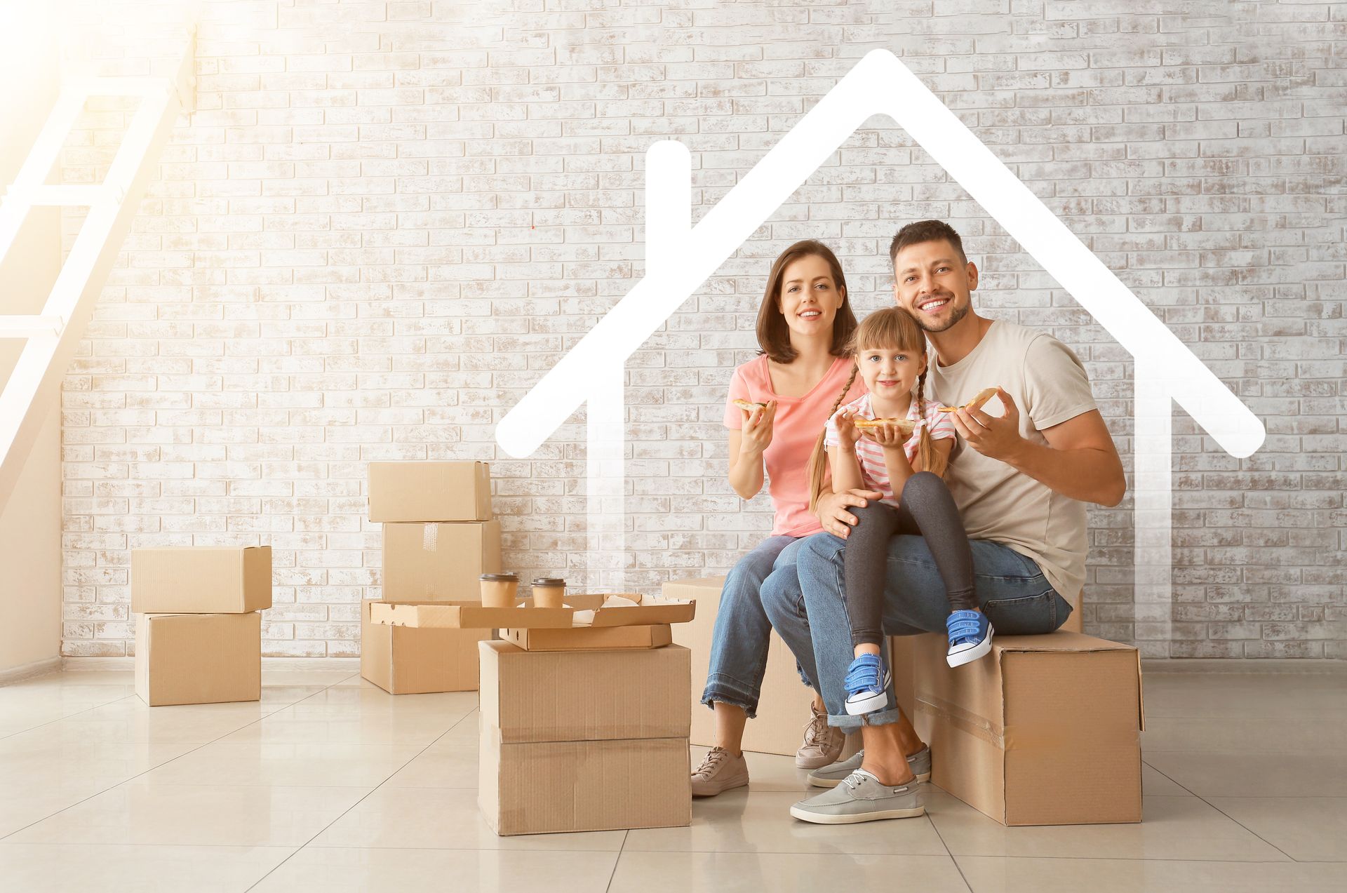 Family sitting among moving boxes inside a bright home with a large house outline drawn on the wall