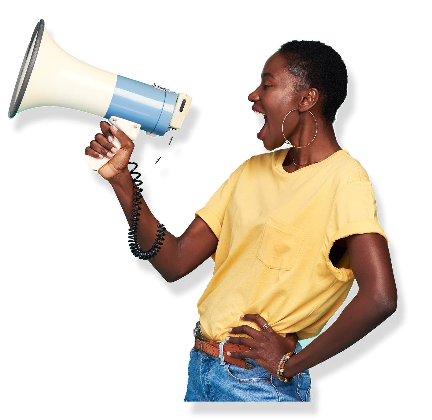 Woman with a megaphone, yelling, wearing a yellow shirt and jeans.