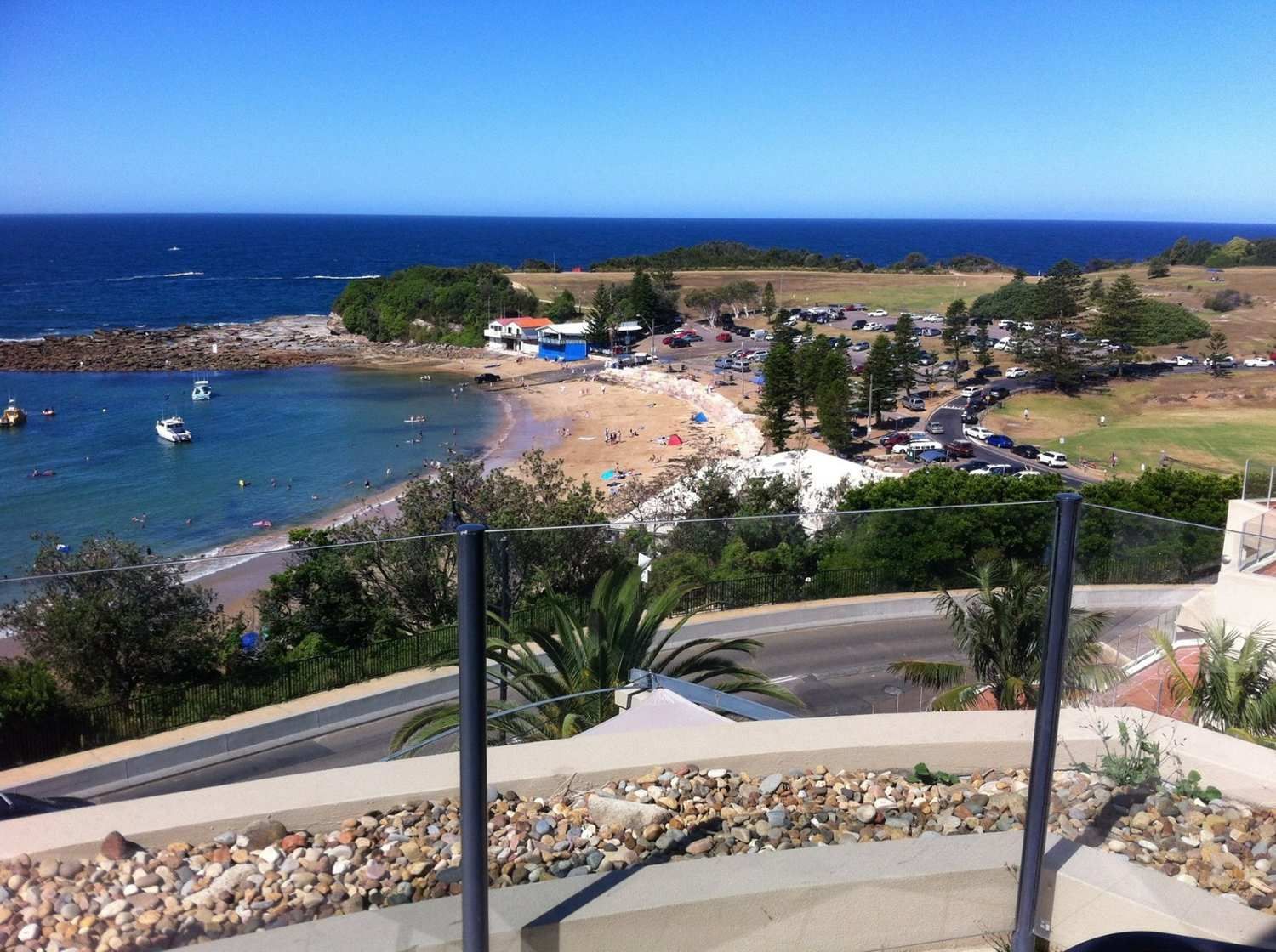 A View of a Beach and the Ocean From a Balcony — Kincumber Glass & Glazing in Kincumber, NSW