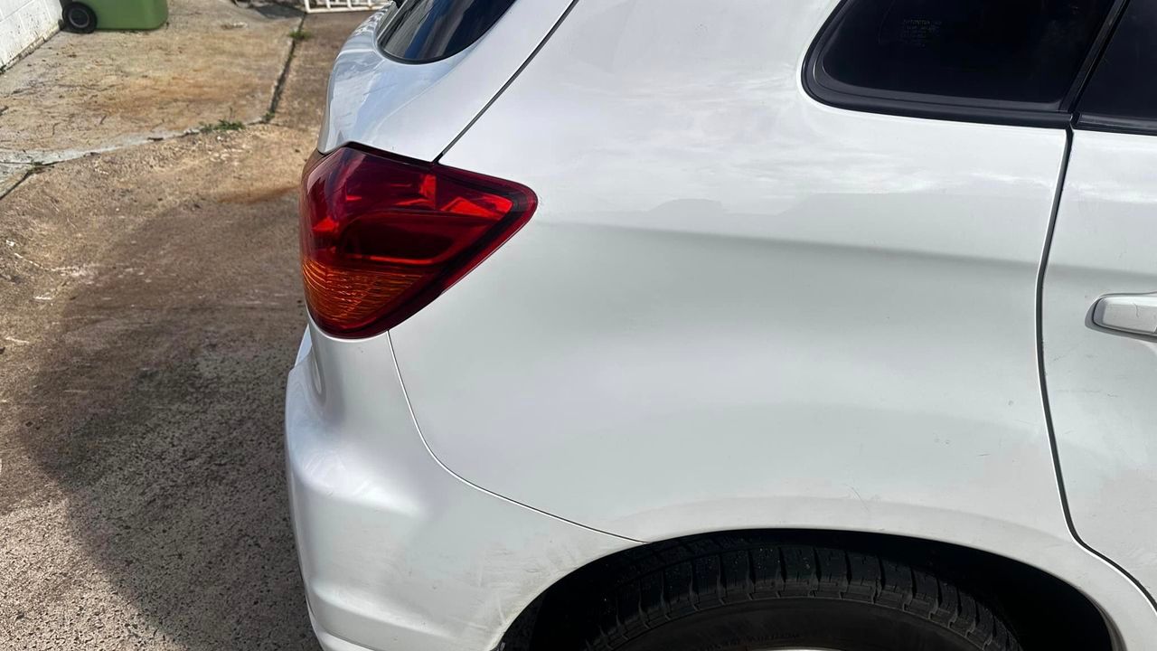 Right Side of A White Car After — Professional Dent Repair in Buderim, QLD