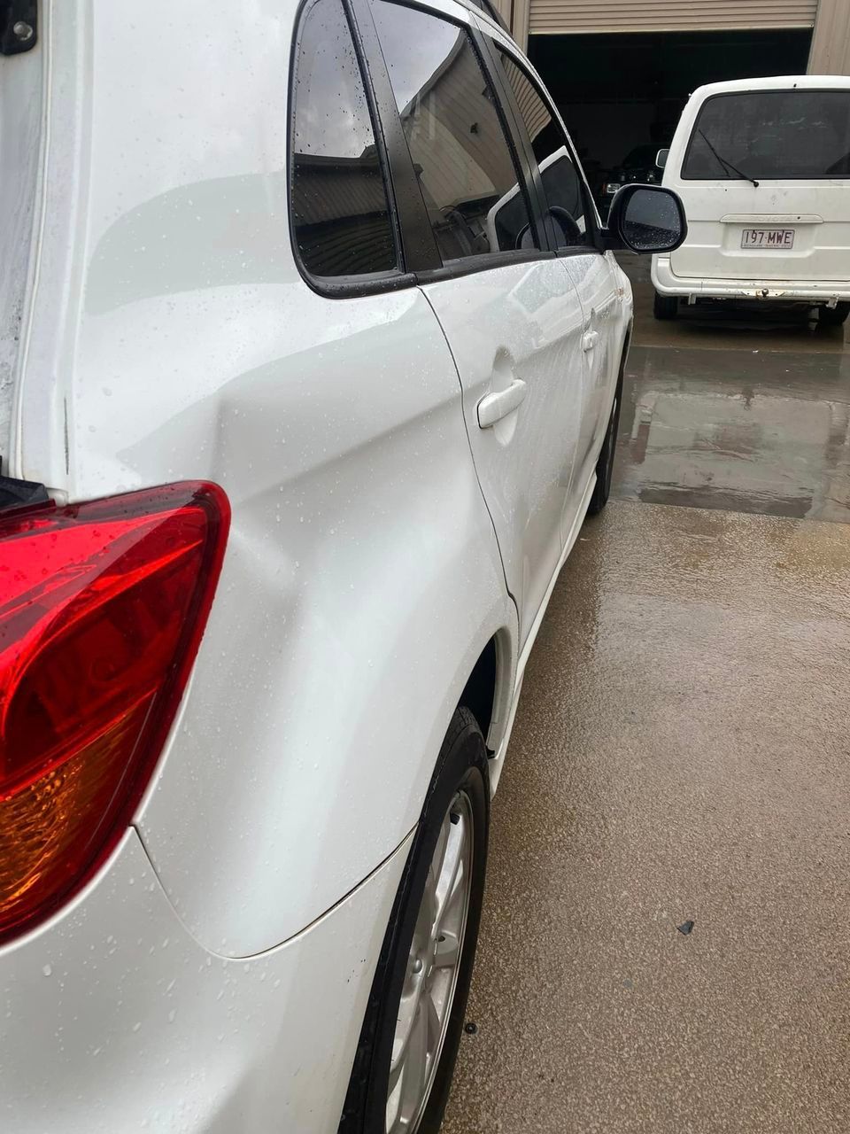 Right Side of A White Car Before — Professional Dent Repair in Buderim, QLD