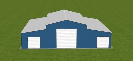 Blue barn with white doors and gray roof on a green background.