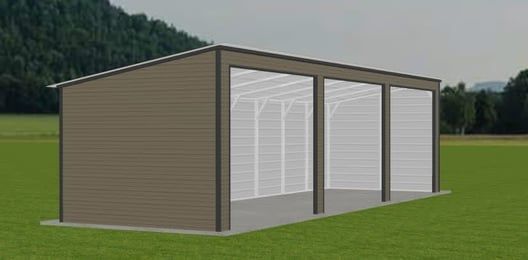 Brown metal building with open bays, on a grassy field, with a mountain in the background.