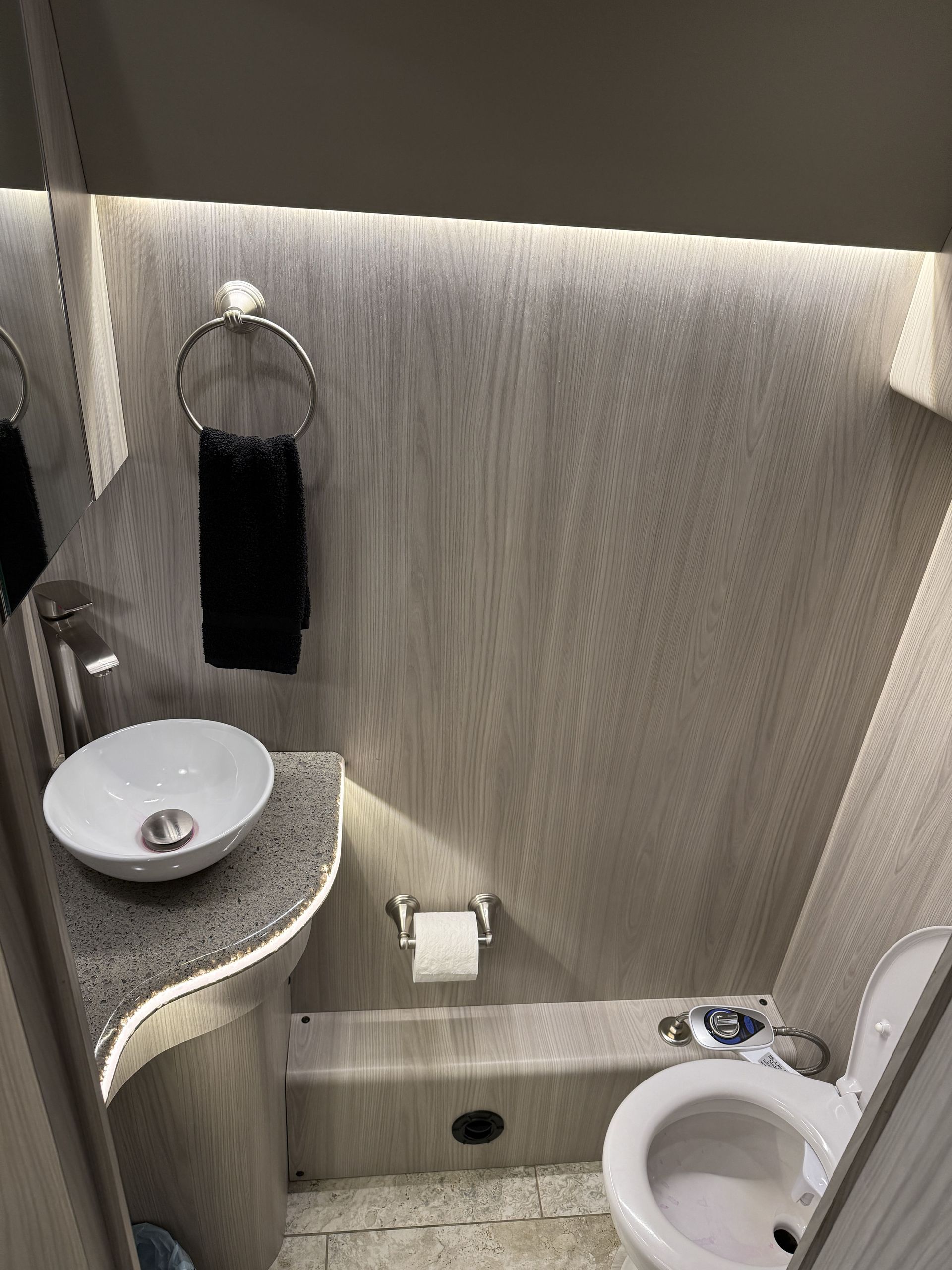 Entertainment system with flat-screen TV, DVD player, stereo, and satellite reception