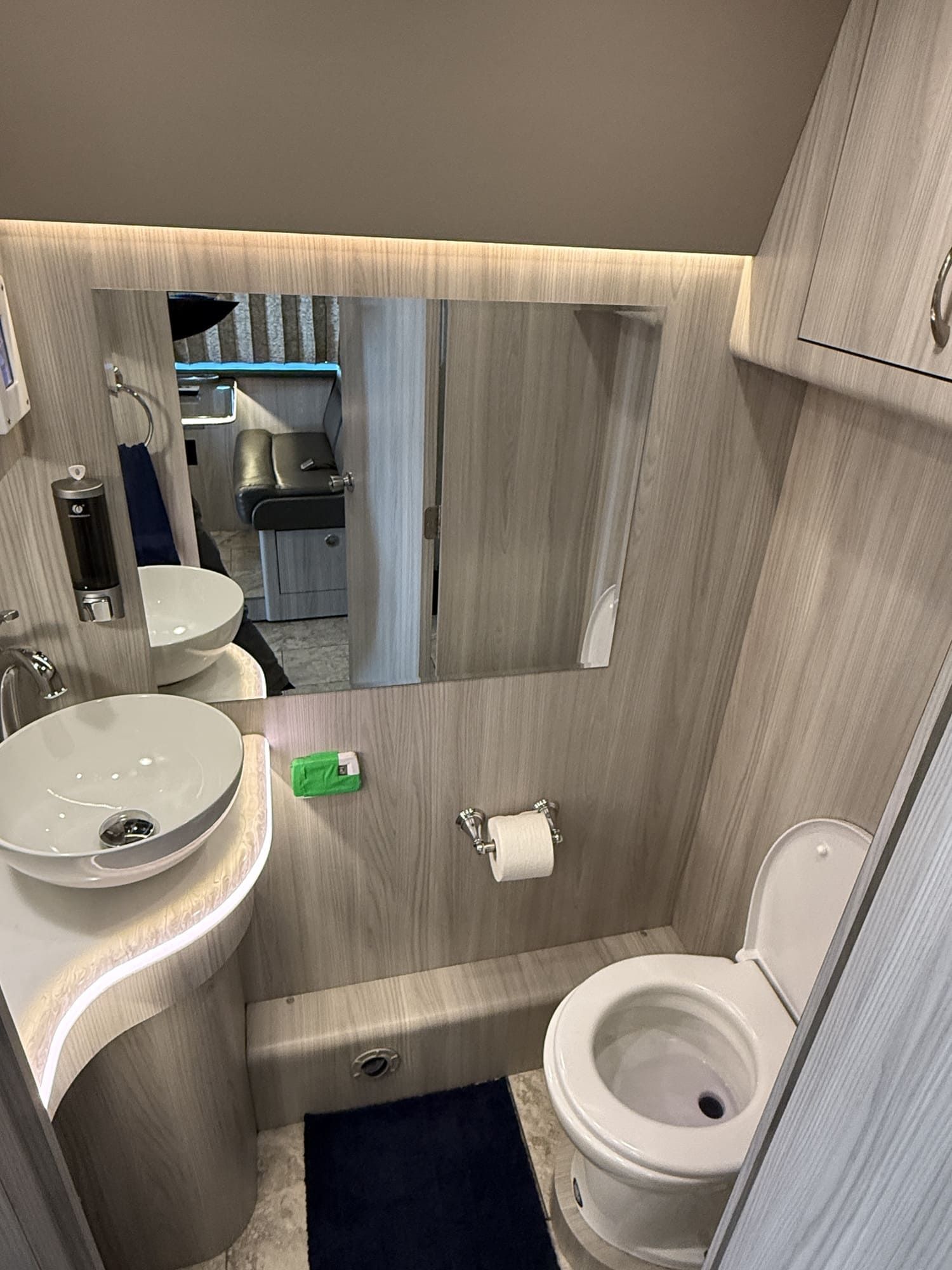 Coach 20 front slide-out expanded to reveal luxurious open living area