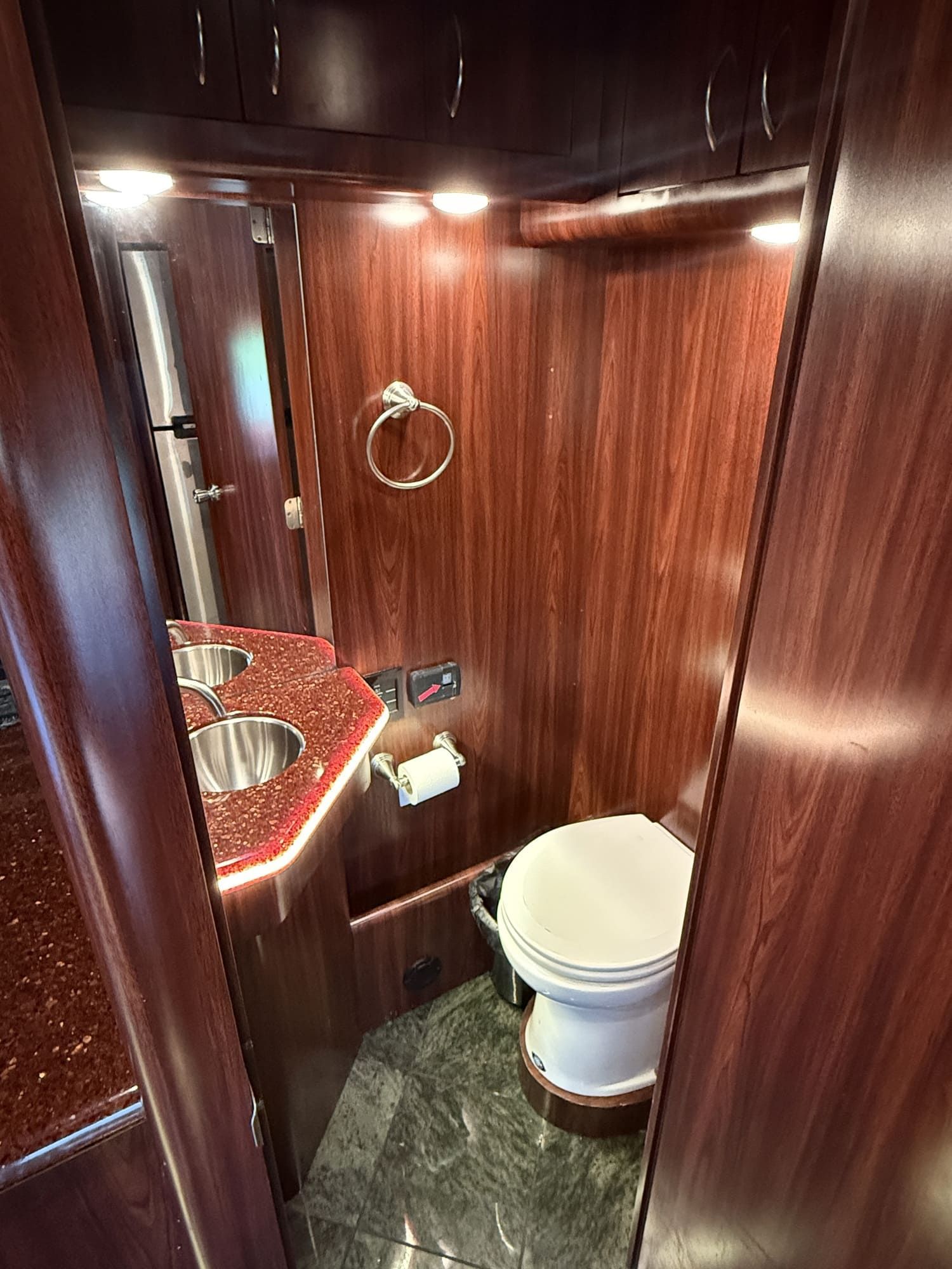 Rear lounge with plush seating and entertainment features for crew relaxation