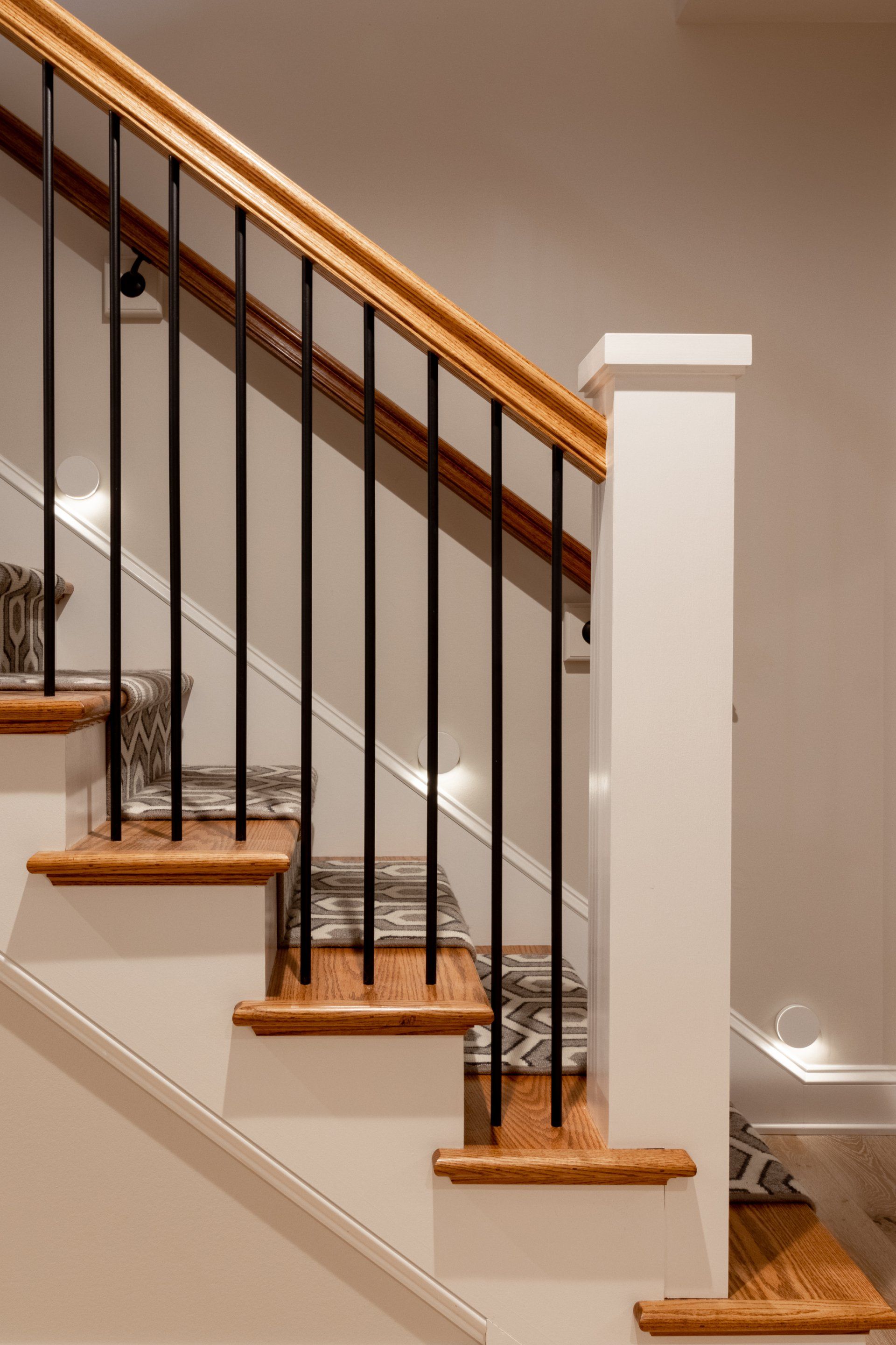 Clean line, wrought iron and wood staircase