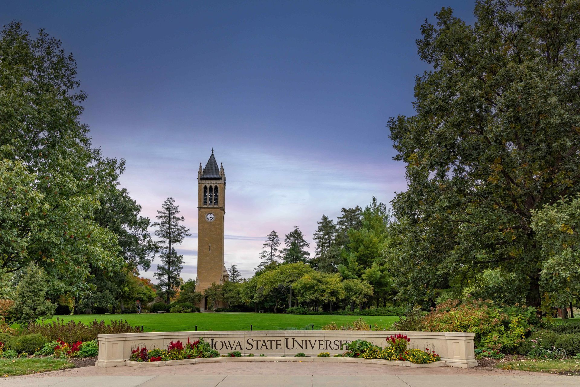 The Stanton Memorial Carillon tower stands behind a stone sign reading 