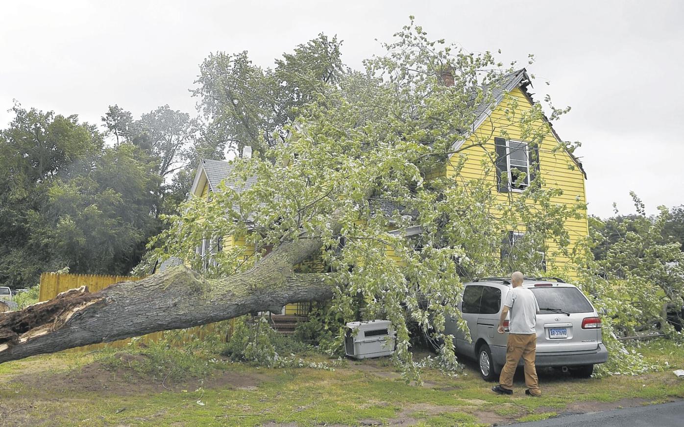 Isaias Tropical Storm fells tree on house Connecticut