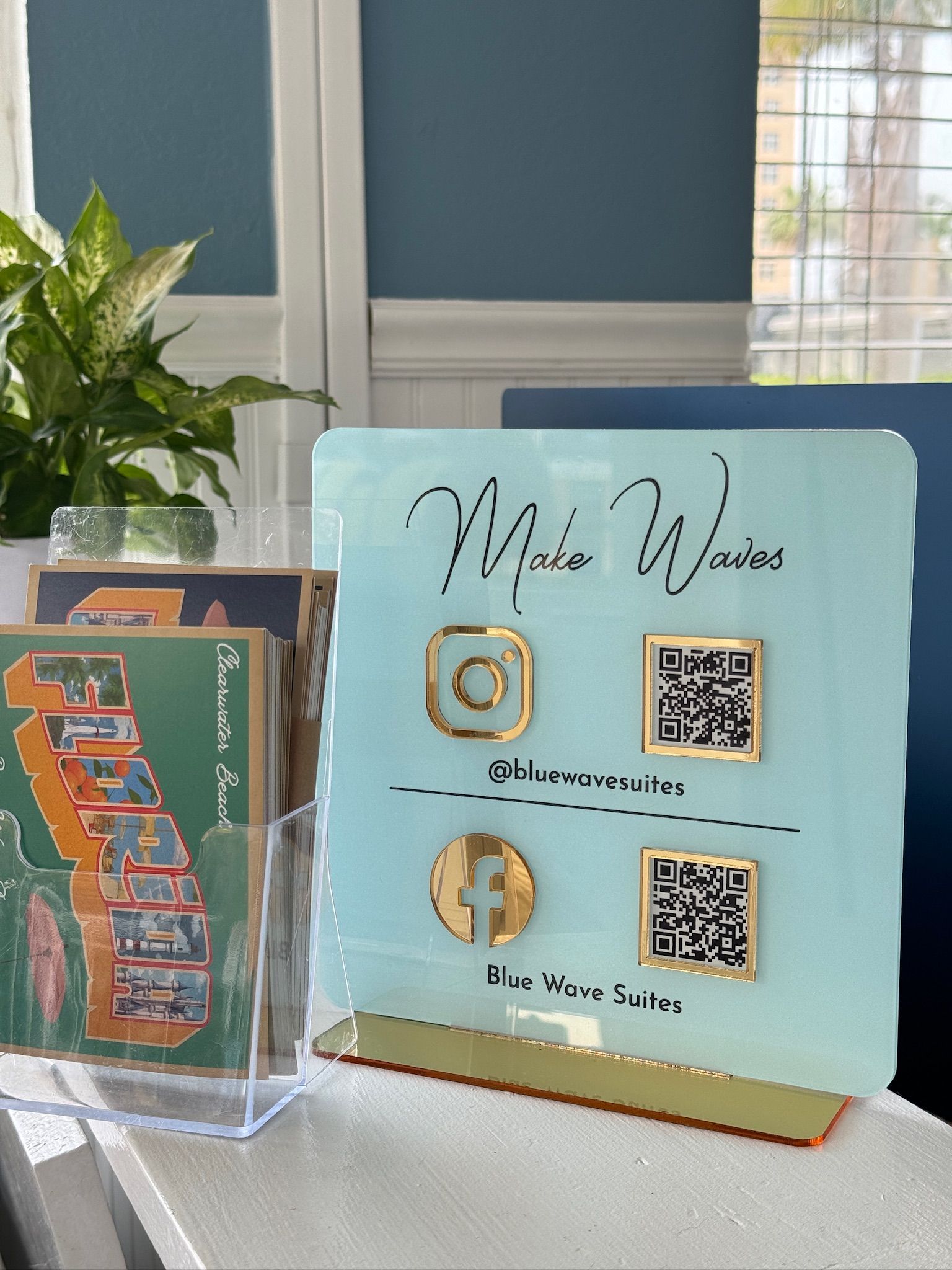 A sign on a table that says ' mile wide ' on it