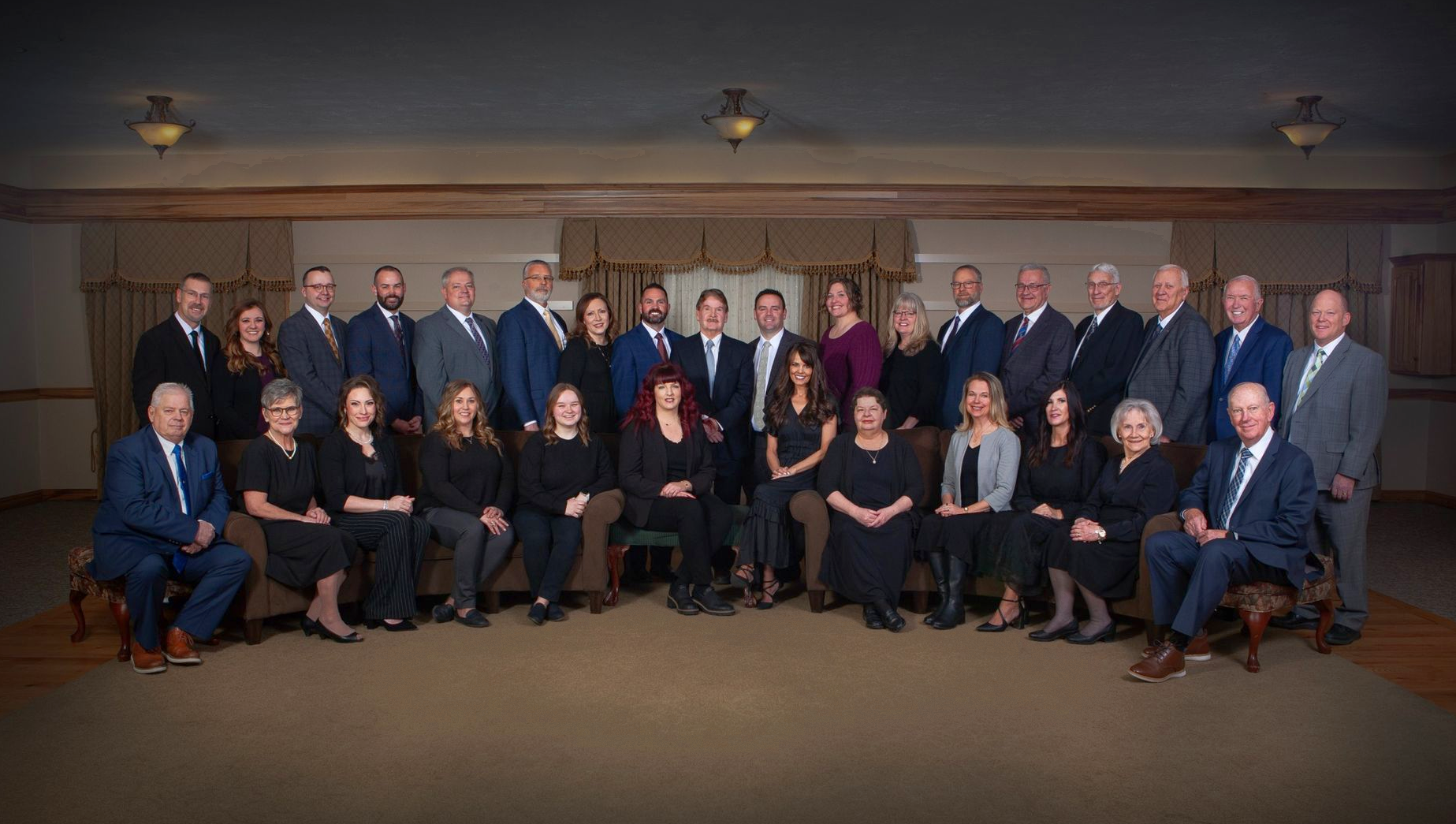 A large group of people are posing for a picture.