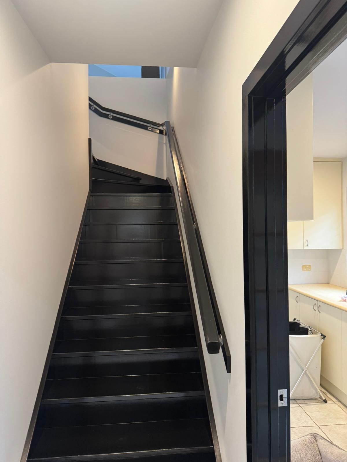 Black Painted Stairs Leading Upwards, With White Walls — Andrew Harper Painting & Decorating in Albury, NSW