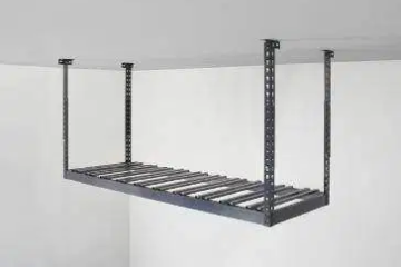 A 2x6 metal shelf is hanging from the ceiling in a garage.