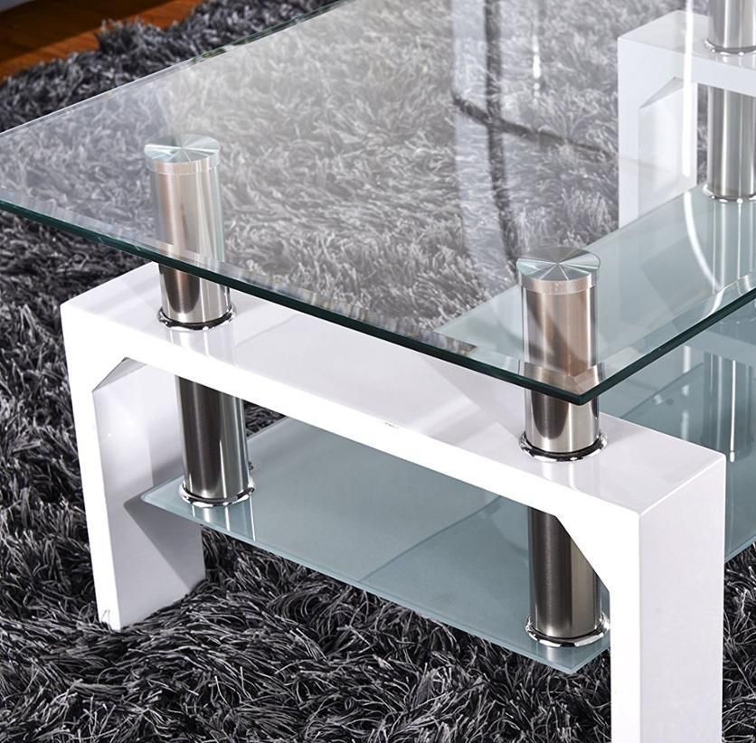 Modern bathroom with black vanity, gold hardware, white countertop, and mirrors.