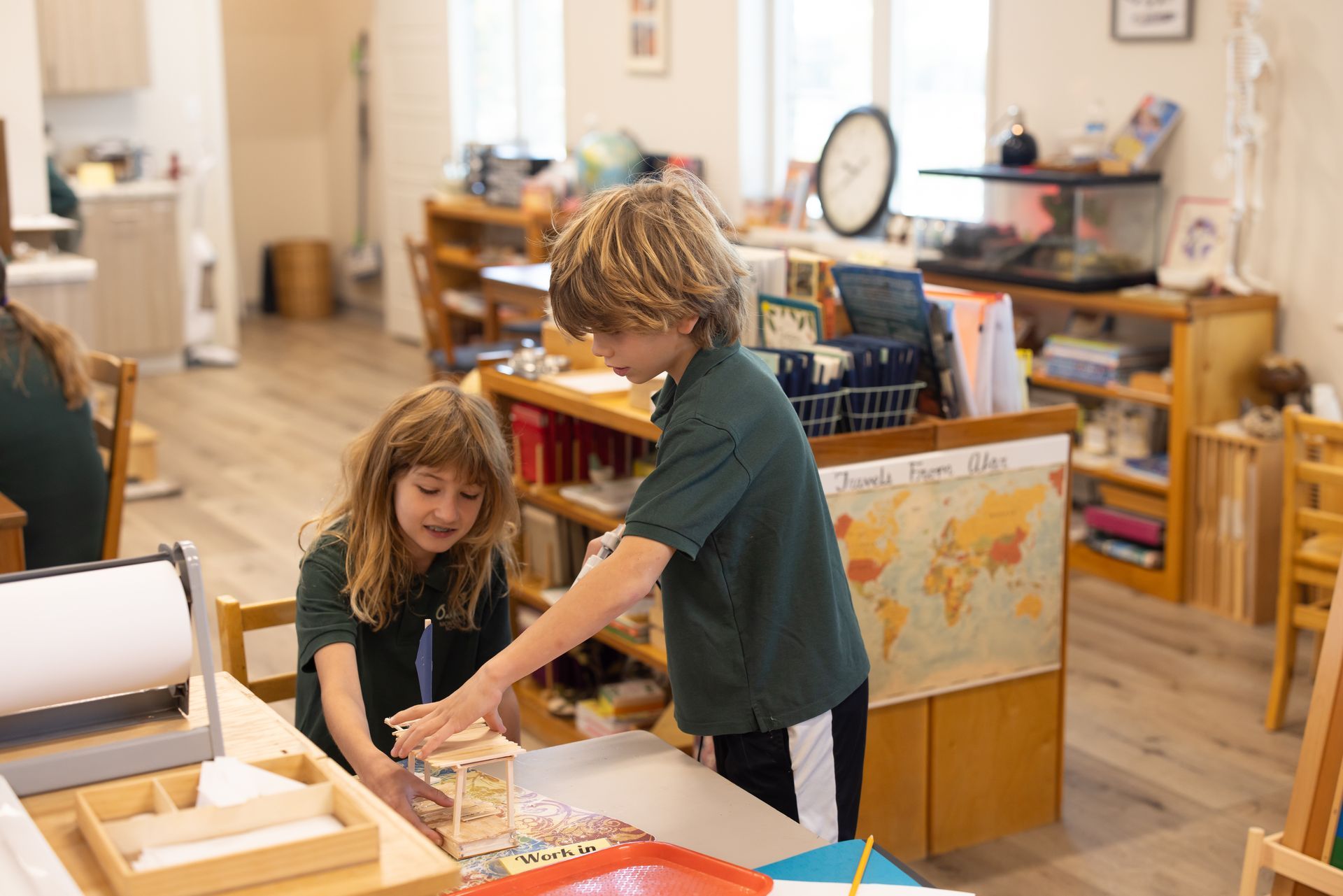 Children working in montessori classroom