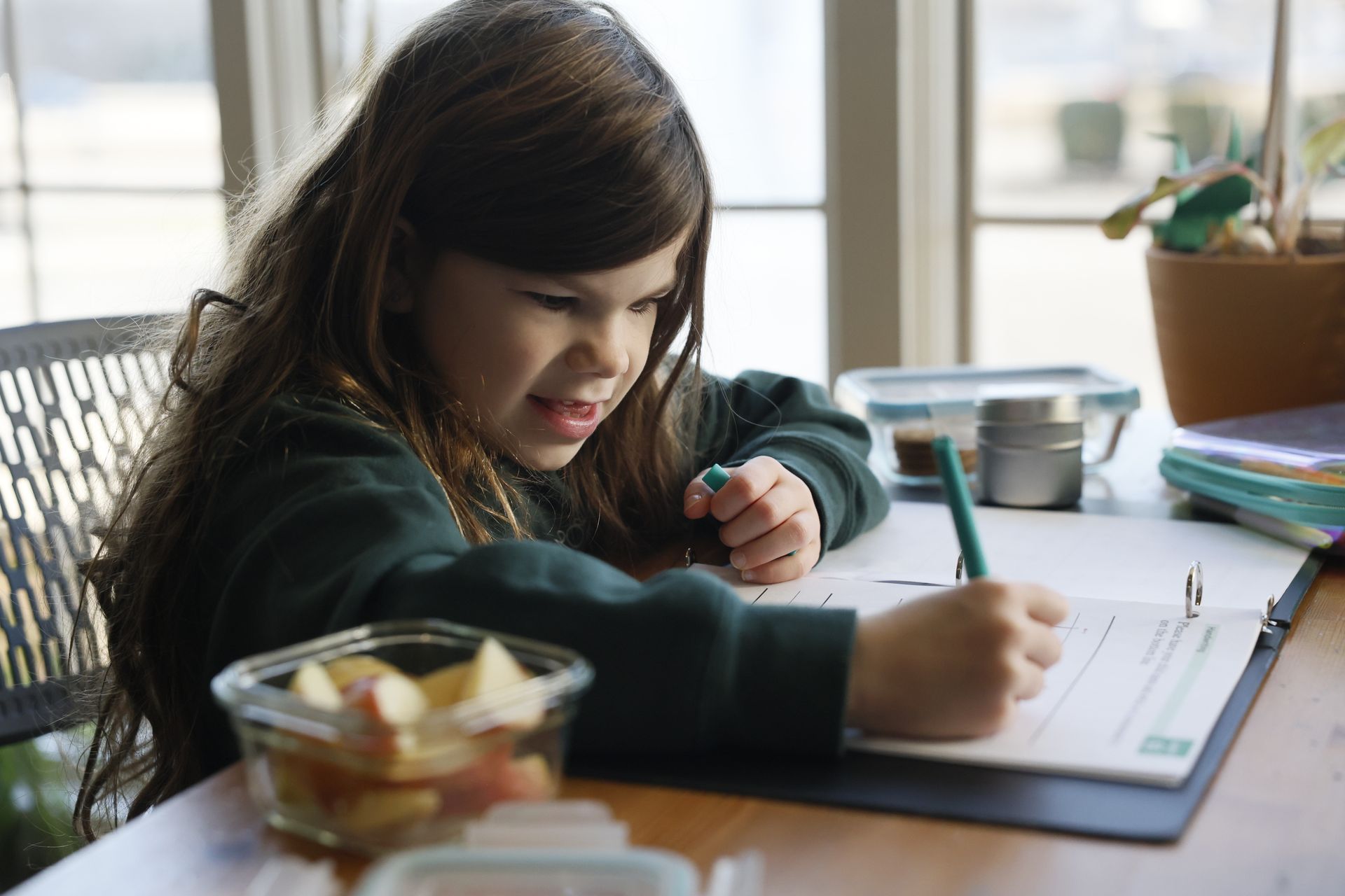 Montessori child working in classroom