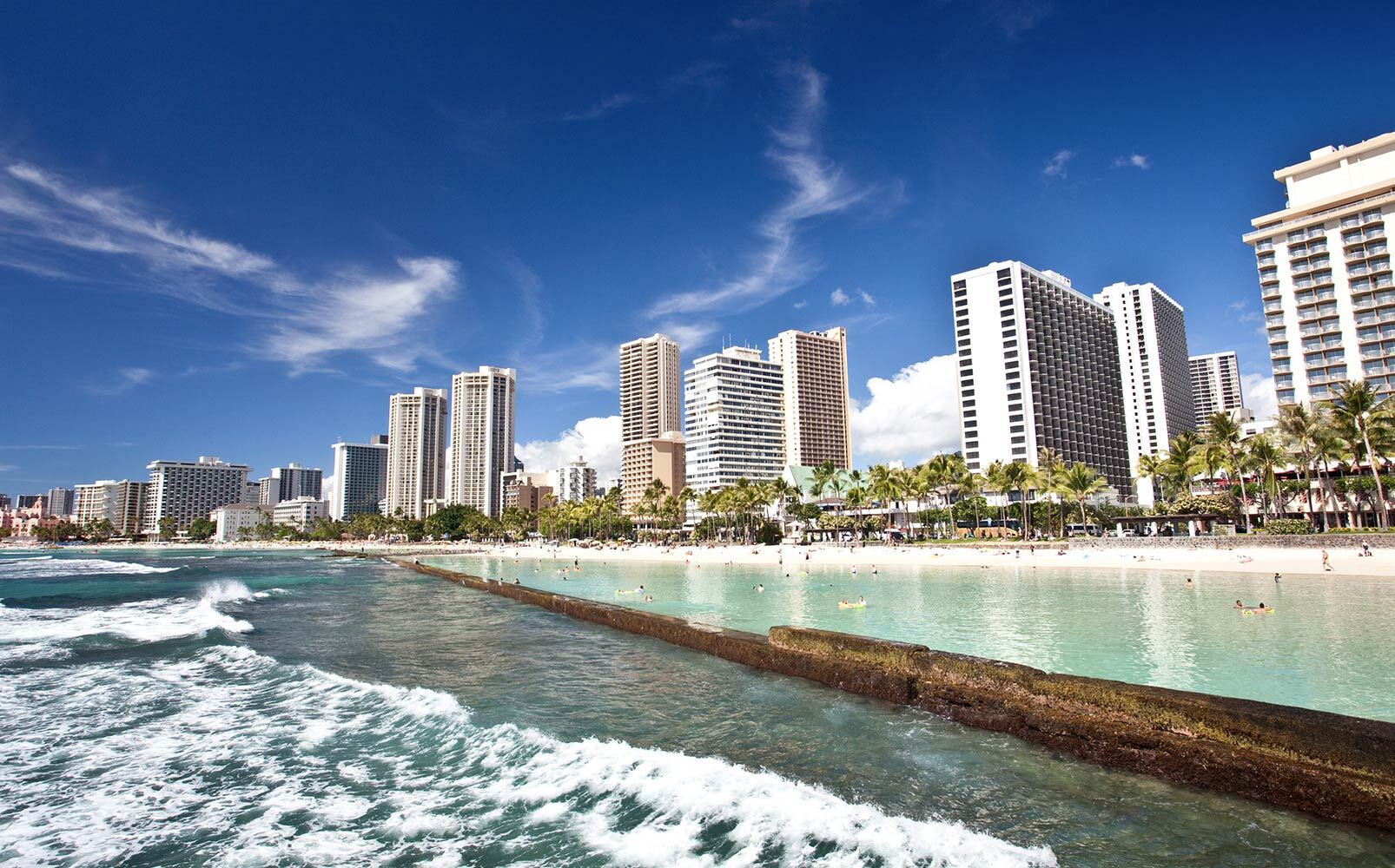 Waikiki Beach with High-Rise Buildings – Honolulu, HI – Hawaiian Properties