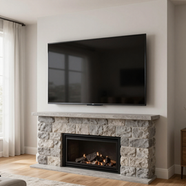 Modern living room with a stone fireplace and a wall-mounted flat-screen TV