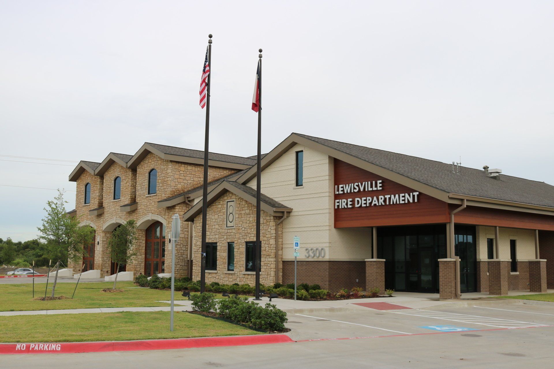 Two Flagpoles in Front — Arlington, TX — FSI