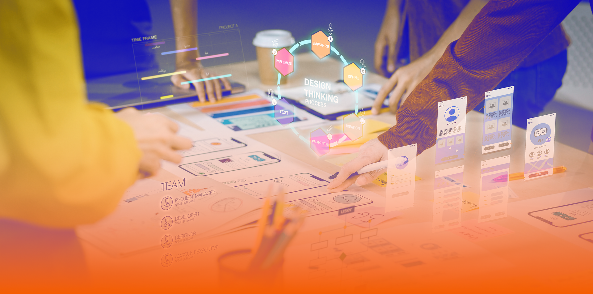 A group of people are sitting around a table working on a project.